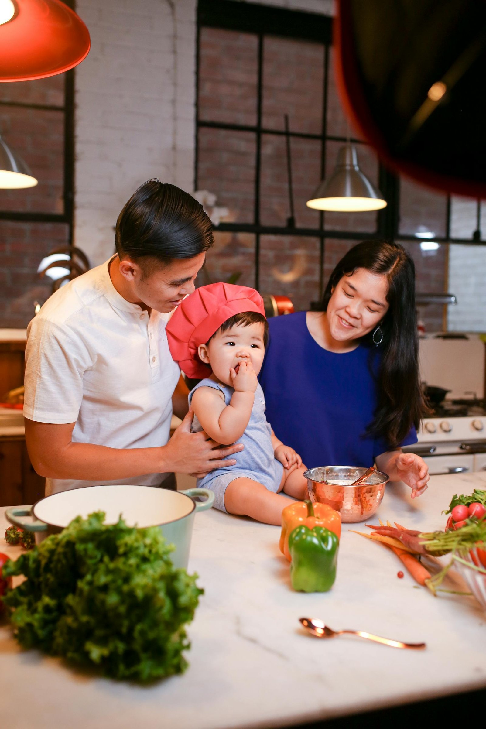 A joyful family cooking together in their home kitchen, fostering love and bonding.